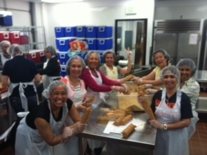 Volunteers packaging meals